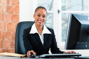 A paralegal works at her computer