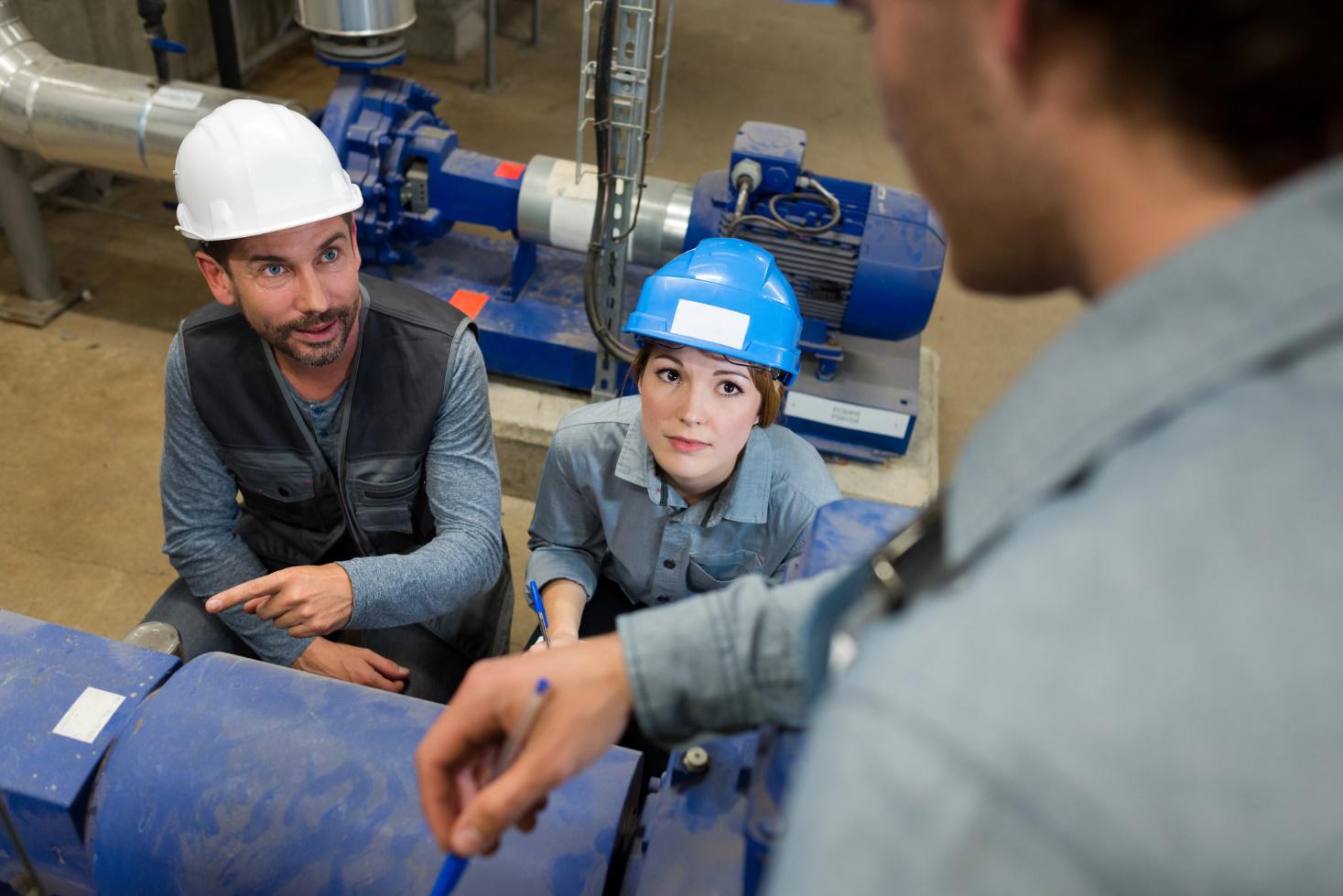 Trade school students learn on the job during a work term