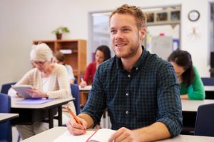 A male student in class.